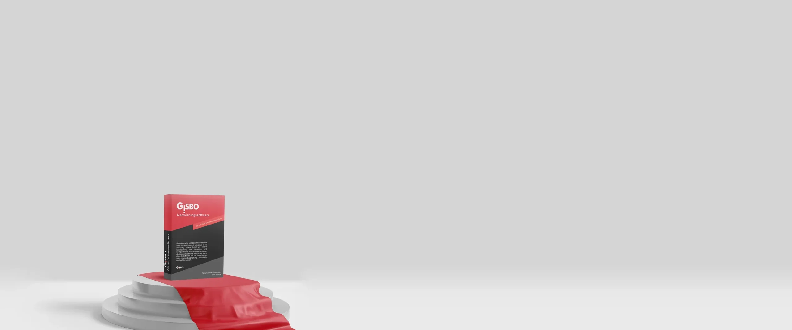 Softwarebox der Alarmierungssoftware GisboAlarm auf einem Podest mit rotem Tuch